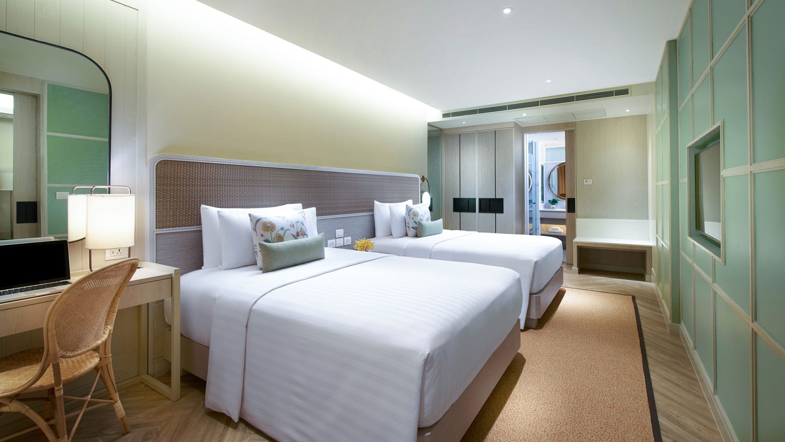 Queen beds in second bedroom in Amari Suite Poolside