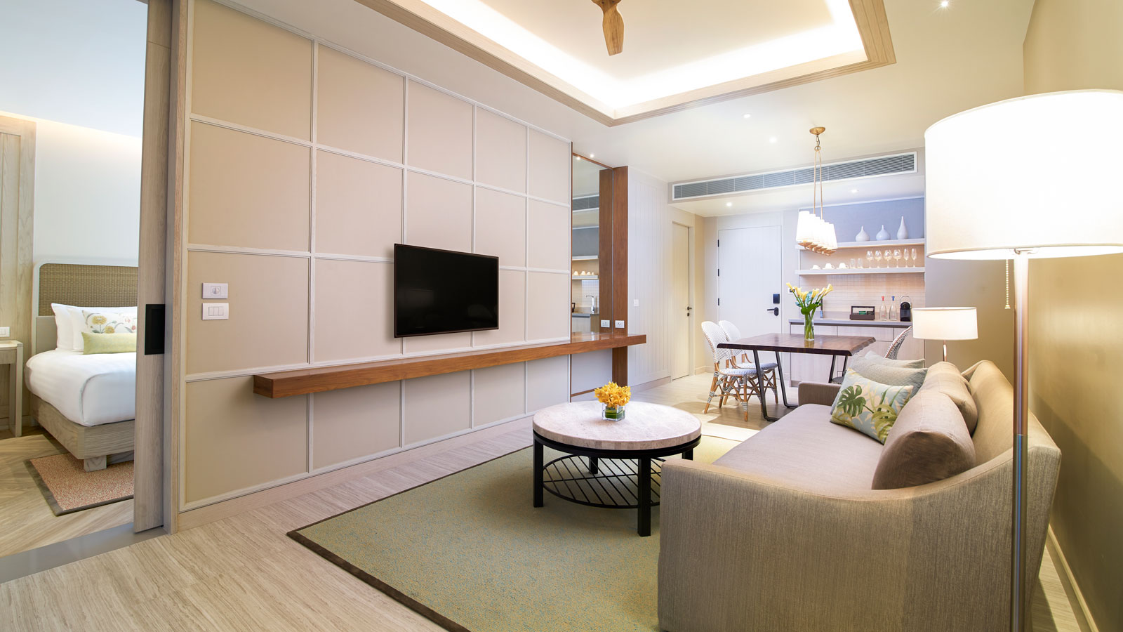 Flat-screen TV in living room in Amari Suite