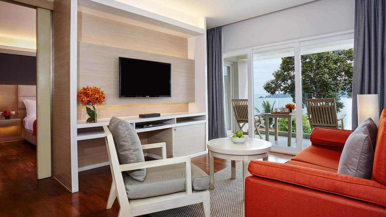 Separate living and dining room in Corner Suite Ocean Front Balcony