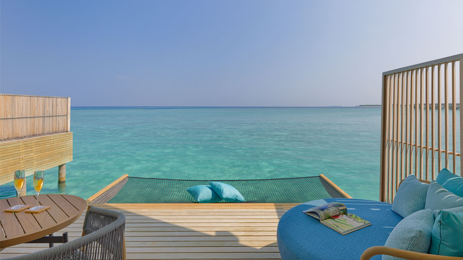 Terrace with daybed and hammock at Sunset Ocean Villa - Amari Raaya Maldives